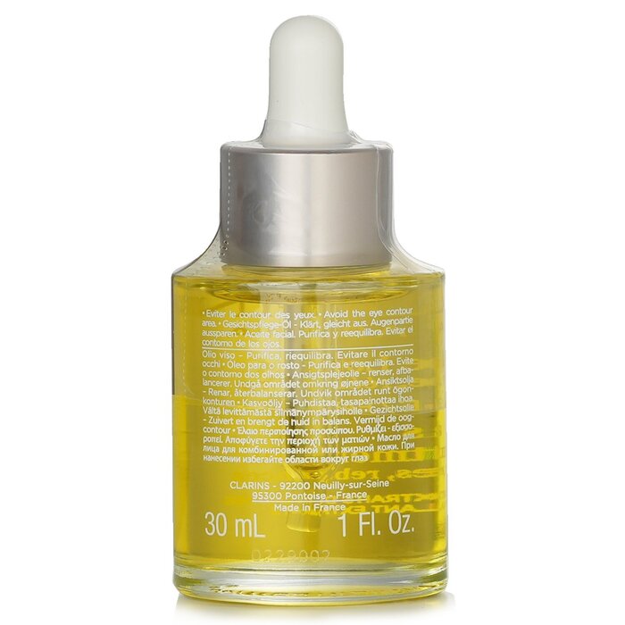 Clarins face treatment oil with lotus for combination to oily skin 30ml/1oz
